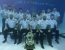 The Canadian Naval Diving Academy celebrates graduation by taking their class picture underwater